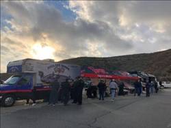Contestants line up for start of diamond valley lake bass fishing tournament